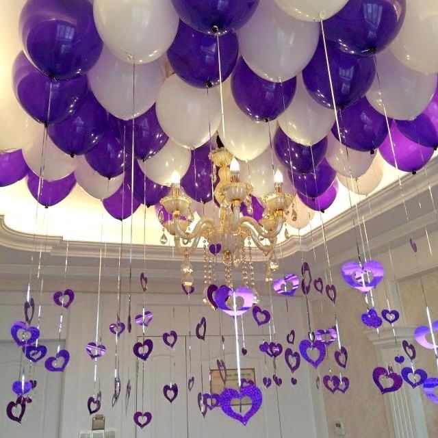 balloon chandelier with hanging photo frames